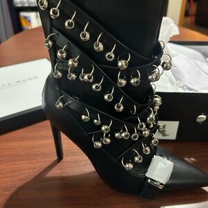 Elegant Black Heeled Boots with Silver Detailing
